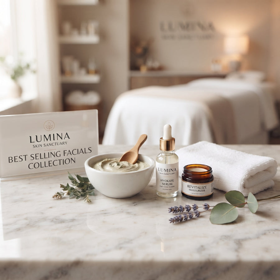 Lumina sign reading Best Selling Facials Collection beside a clay mask bowl, serum bottle and folded towel on a marble counter in a Fort Myers, FL facial studio